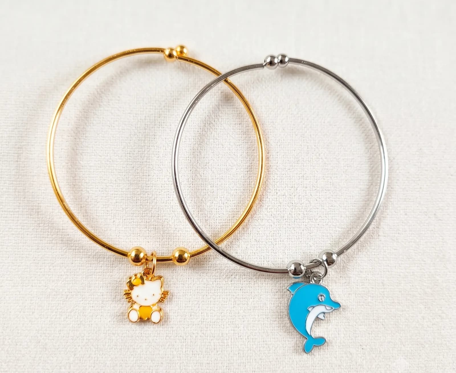 Dual Tone Kitty And Dolphin Charm Bangle Bracelets